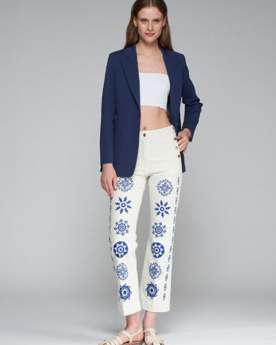 PANTALON BLANCO DETALLES AZULES